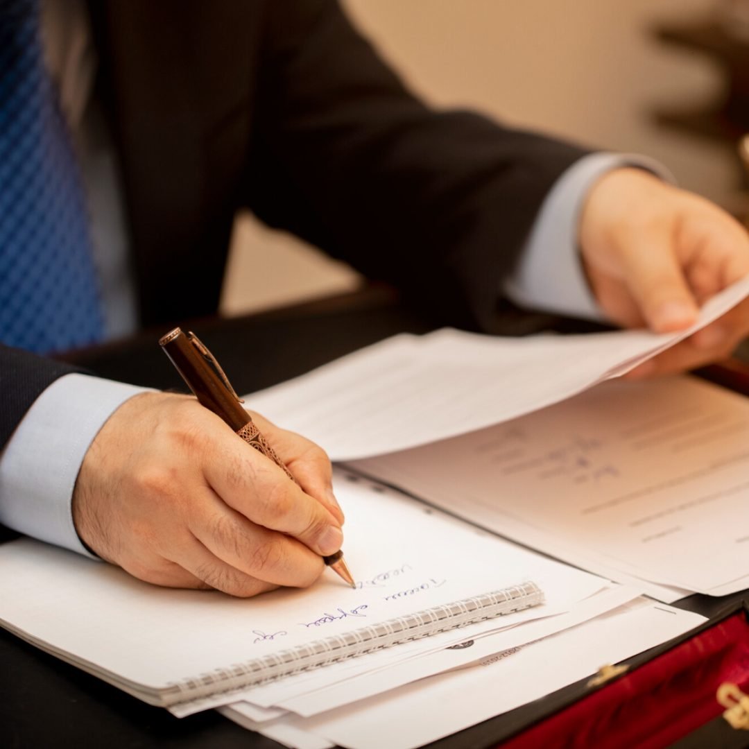 businessman-signing-important-contract-papers